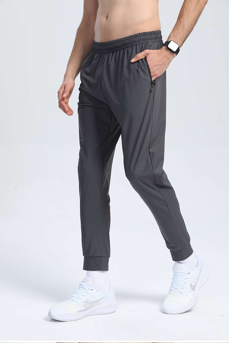Four-sided stretch fitness ice silk quick-drying pants thin section slim fit long pants outdoor fashion overalls men's pants